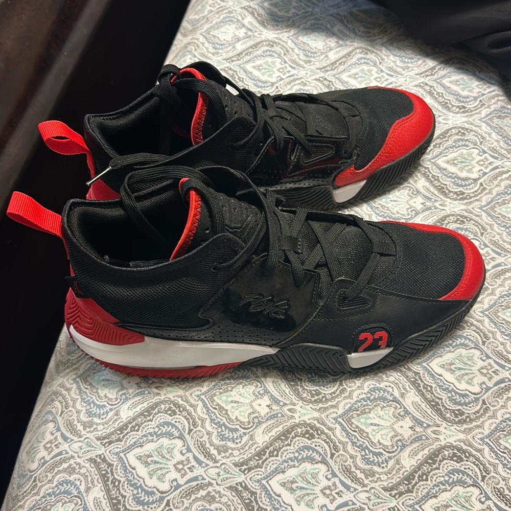 Black and red Jordan stay loyal sneakers 10.5